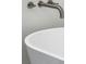 Close-up of modern standalone tub with sleek faucet and fixture at 1027 Wayfarer Ln, Charleston, SC 29412