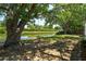 Lakeside view from the property, offering serene waterfront scenery and natural charm at 1027 Wayfarer Ln, Charleston, SC 29412