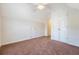 This carpeted bedroom features a ceiling fan and multiple closet spaces for plenty of storage at 1042 Cobblestone Blvd, Summerville, SC 29486
