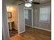 This bedroom features wood floors and mirrored closet doors at 105 Pandora Dr, Goose Creek, SC 29445