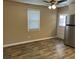 Cozy dining area with stainless steel refrigerator, ceiling fan, and view of window with blinds at 105 Pandora Dr, Goose Creek, SC 29445