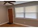 Light-filled living room featuring hardwood floors, neutral walls, and a window with bright natural light at 105 Pandora Dr, Goose Creek, SC 29445