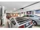 Showcasing a garage with a diverse collection of luxury cars at 1093 Ave Of Oaks, Charleston, SC 29407