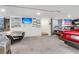 Spacious garage featuring an impressive collection of automobiles at 1093 Ave Of Oaks, Charleston, SC 29407