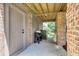 Covered outdoor area with a grill and access to the yard at 1093 Ave Of Oaks, Charleston, SC 29407