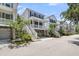 Pleasant street view showcasing well-maintained homes, lush greenery, and charming curb appeal at 1093 Ave Of Oaks, Charleston, SC 29407
