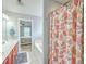 Bright primary bathroom with a large bathtub with blue walls, and tile flooring, with a large vanity at 111 Kapalua Run, Summerville, SC 29483