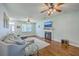 Cozy living room with a fireplace, TV, hardwood flooring and comfortable seating at 111 Kapalua Run, Summerville, SC 29483