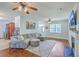 Comfortable living space featuring hardwood floors, a fireplace, and a sectional sofa at 111 Kapalua Run, Summerville, SC 29483
