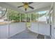 Covered patio area featuring a ceiling fan, with a view of the backyard at 111 Kapalua Run, Summerville, SC 29483