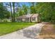 Well-maintained house featuring a spacious driveway and a neatly kept lawn at 116 Runnymede Ln, Summerville, SC 29485