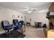 Versatile space with a brick fireplace, functional workspace, and a cozy dining area at 116 Runnymede Ln, Summerville, SC 29485