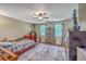 bedroom featuring hardwood floors, a ceiling fan, and colorful accents and decorations at 121 Woodland Dr, Summerville, SC 29485