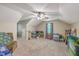 Large bonus room with neutral carpet, lots of natural light, and ample storage space at 121 Woodland Dr, Summerville, SC 29485
