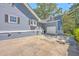 Exterior view of the home showing blue siding, white trim, garage, and concrete driveway at 121 Woodland Dr, Summerville, SC 29485