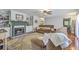 Cozy living room with a fireplace, built-in shelves, hardwood floors, and comfortable seating at 121 Woodland Dr, Summerville, SC 29485