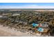Aerial view of The Sandcastle community showcasing lush landscaping, pools, and proximity to the beach at 1355 Dunlin Ct # Share D, Kiawah Island, SC 29455