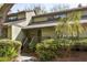 Charming home with a cozy porch, complemented by lush green landscaping, creating a welcoming curb appeal at 1355 Dunlin Ct # Share D, Kiawah Island, SC 29455