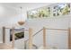 Elegant stairwell with modern railings and contemporary light fixture at 1355 Dunlin Ct # Share D, Kiawah Island, SC 29455