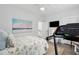 Bedroom with artwork, television, natural light, and a treadmill for exercise at 137 Bratton Cir, Mount Pleasant, SC 29464