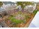 A view of the community courtyard and neighborhood from a charming outdoor balcony at 137 Bratton Cir, Mount Pleasant, SC 29464