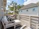 Relaxing deck featuring cushioned seating, a bright umbrella, and a view of the surrounding neighborhood at 137 Bratton Cir, Mount Pleasant, SC 29464