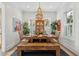 Stylish dining room featuring a rustic wooden table with bench seating, wicker chairs, and large windows at 137 Bratton Cir, Mount Pleasant, SC 29464
