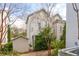 Exterior view showcases the house with well-kept landscaping, a shed, and a neighborhood feel at 137 Bratton Cir, Mount Pleasant, SC 29464