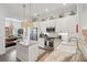 Spacious kitchen with marble countertops, white cabinets, stainless appliances, open to the dining area at 137 Bratton Cir, Mount Pleasant, SC 29464
