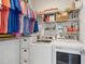 Efficient laundry room with washer, dryer, shelving, and ample storage space at 137 Bratton Cir, Mount Pleasant, SC 29464