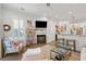 Bright and airy living room features stylish decor and hardwood floors at 137 Bratton Cir, Mount Pleasant, SC 29464