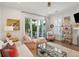 Open concept living room with hardwood floors and lots of natural light at 137 Bratton Cir, Mount Pleasant, SC 29464
