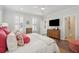 Bright main bedroom with hard wood floors and plush pillows at 137 Bratton Cir, Mount Pleasant, SC 29464