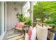 Relaxing screened patio features comfortable seating and lush greenery at 137 Bratton Cir, Mount Pleasant, SC 29464