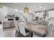 Spacious dining area offering an open floor plan to the living room and kitchen at 1387 Thin Pine Dr, Johns Island, SC 29455