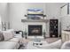 Comfortable living room featuring a fireplace and built in shelving for stylish storage solutions at 1387 Thin Pine Dr, Johns Island, SC 29455