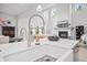 Modern kitchen sink featuring stainless steel fixtures, a bright countertop, and plenty of natural light at 1387 Thin Pine Dr, Johns Island, SC 29455