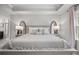 Comfortable main bedroom featuring a neutral color scheme and bedside table decor at 1387 Thin Pine Dr, Johns Island, SC 29455