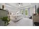 Spacious main bedroom suite featuring tray ceilings, neutral decor, and natural light at 1387 Thin Pine Dr, Johns Island, SC 29455