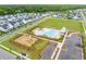 Aerial view of the community with pool, playground, parking, and sidewalks at 1446 Crane Creek Dr, Mount Pleasant, SC 29466