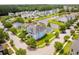 Aerial view of the community with waterfront homes, lush landscaping, and winding streets at 1446 Crane Creek Dr, Mount Pleasant, SC 29466