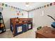 Playful bedroom featuring a bed with a curtained base and a desk area at 1446 Crane Creek Dr, Mount Pleasant, SC 29466