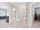 Carpeted hallway leads to rooms with open doorways for easy flow and access at 1446 Crane Creek Dr, Mount Pleasant, SC 29466