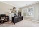 Office space with carpet, large window, and built in shelving and desk space at 1446 Crane Creek Dr, Mount Pleasant, SC 29466