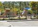 Fun community playground with slides, swings, and climbing structures, ideal for families at 1446 Crane Creek Dr, Mount Pleasant, SC 29466