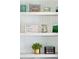 Built-in shelving displays decorative items and books, enhancing the room's character at 1446 Crane Creek Dr, Mount Pleasant, SC 29466