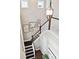Staircase with wood and white banister, and decor wall with framed prints at 1446 Crane Creek Dr, Mount Pleasant, SC 29466