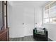 Bright bedroom featuring a comfortable green chair and a window with natural light at 1514 Patterson Ave, Charleston, SC 29412