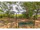 Secluded garden grounds with a swing and grill next to marsh at 1514 Patterson Ave, Charleston, SC 29412