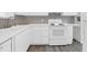 Modern kitchen with stainless appliances, white cabinets and drawers, and plenty of counter space at 1514 Patterson Ave, Charleston, SC 29412